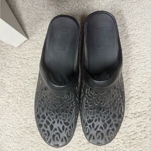 Dansko Black Women's Mules with Cutout Design